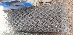 lot 13 image: Roll of fencing 4 ft high  - dont know length