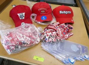lot 23 image: Wisconsin Badgers lot - hats and lanyards with badges