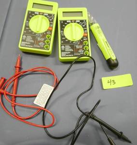 lot 43 image: 2 new multimeters, one set of leads, and a chirper