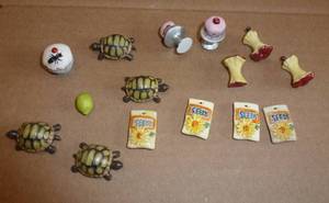 lot 81 image: Lot of porcelain miniatures that came out of trinket boxes that were broken.  So each item is an inch or less.