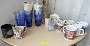 lot 107 image: 8 blue drinking glasses like new, 7 smaller light blue design glasses and various coffee cups