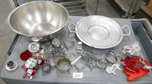 lot 139 image: large stainless mixing bowl, bunch of cookie cutters, hammered aluminum serving plate