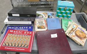 lot 142 image: 3 ring binders, books, empty box