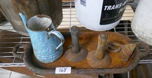 lot 168 image: 2 hide scrapers, old tin and a wood barrel