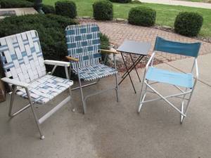 Small folding table with 3 lawn chairs