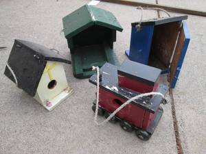 Lot of bird houses and feeders