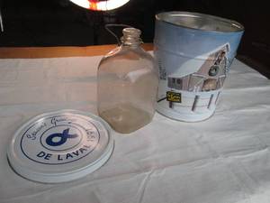 DeLavall tin with vintage milk jug