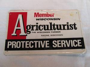 Wisconsin Agriculturist metal sign .