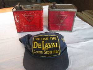 DeLaval cap and oil cans.