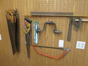Collection of saws, clamps a square etc