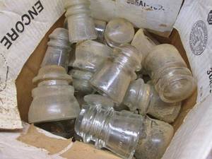 Box of clear glass fence insulators