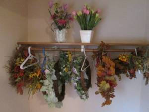 Lot of artificial flowers and wreaths