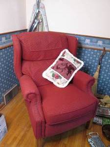 Easy chair with matching pillow.