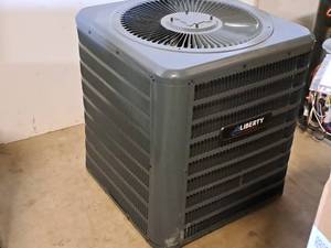lot 8 image: Goodman 2-Ton 13-SEER Single Stage Air Conditioner GSX130241FA
