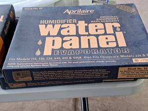 lot 51 image: Lot of (2) Aprilaire Water Panel Humidifer Evaporators (in original packaging)