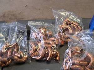 lot 61 image: Lot of (40) Copper Elbows