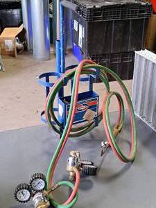 lot 70 image: Uniweld Torch Tank Holder with Torch Lines, Regulator and Torch Head