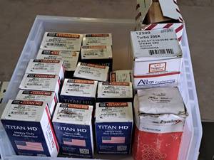 lot 82 image: Lot of (16) Titan HD 440370V Motor Run Capacitor - Oval (in original packaging) with Valcon Heat Pump Filter TBF083S 38