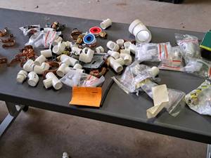 lot 112 image: Misc Hardware - Oatey Copper Tube Straps, PVC Pipe Elbows, ProPress 79705 34 NSF Potable Water Unions, Dottie XAS200 14x2 Metal Anchor