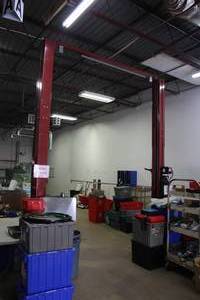 lot 1G image: Challenger E12 12,000-lbs 2-HP 230V 2-Post Lift