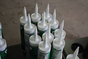 lot 555 image: Lot of (11) Red Devil Industrial Butyl Rubber Sealant