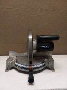 lot 64 image: DELTA SHOPMASTER COMPOUND MITER SAW