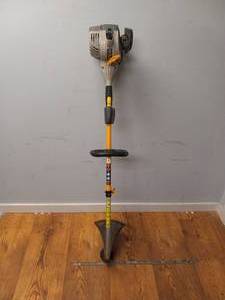 lot 72 image: RYOBI GAS POWERED WEED EATER