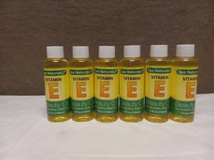 lot 93 image: 6 NEW NATURALS VITAMIN E OIL