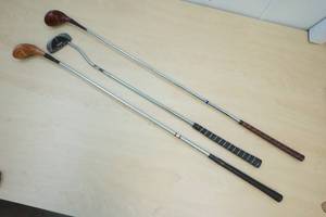 2 vintage golf clubs