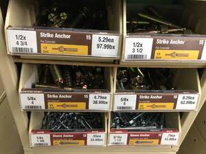 6 BIN CABINET WITH ASSORTED STRIKE ANCHORS