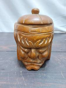 lot 10 image: Head Shaped Wood Lidded Jar