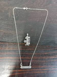 lot 64 image: Sterling Silver Necklace And Pendant With Extra Pendant