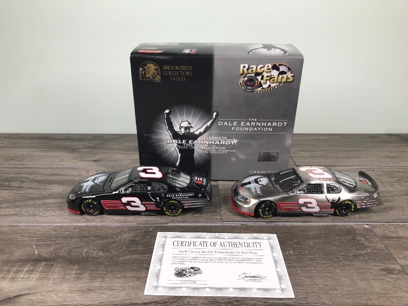 Give Me A Bidd Consignment Auction With Race cars, coins, sports cards