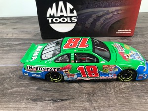 lot 34 image: 2002 Action 10th Anniversary Mac Tools Bobby Labonte Grand Prix #18  Interstate Batteries Muppets 25th Anniversary 124 scale die cast stock car