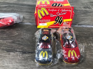 lot 71 image: 1999 Nascar Racing Champions 2 car set Bill Elliott Ford Taurus #94  McDonalds 164 scale die cast stock cars