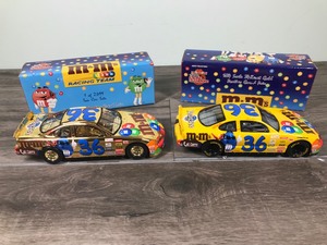 lot 97 image: 1999 Nascar Racing Champions 2 car set Ernie Irvan #36  M&Ms 124 scale die cast stock car