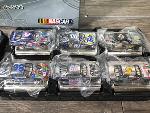 lot 99 image: 1999 Nascar Racing Champions Nascar Introduction Set - 12 silver chrome commemorative cars 164 scale die cast stock cars