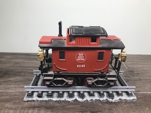 lot 177 image: Vtg Jim Beam Large Train Decanter Red Caboose Car Jersey Western Railway With track