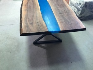lot 4 image: Solid wood dining table with blue epoxy down the middle