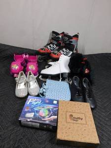 lot 278 image: Roller blades, tap shoes, ice skates and toys