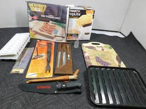 lot 302 image: Fillet knives, popcorn popper, trays, broiler pans, cook books and more