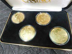 lot 304 image: Grand Casino gold coin set