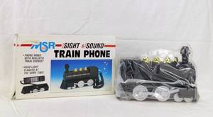 lot 65 image: Vintage 1993 MSR Sound & Light Train Phone