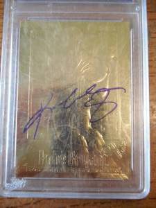lot 46 image: 1996-97 Skybox EX 23KT Gold Kobe Bryant Rookie - Purple Signature Limited Edition Graded GEM MINT 10
