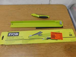 lot 203 image: RYOBI  LVTLVP Cutting Guide and Knife Kit