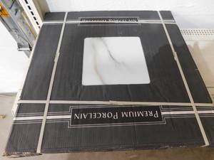 lot 214 image: MSI  White Calacatta Bianco 24 in. x 24 in. Polished Porcelain Floor and Wall Tile (16 sq. ft.Case)