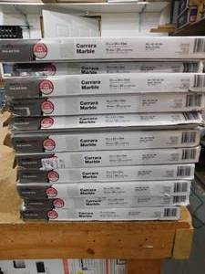 lot 223 image: TrafficMaster  Carrara Marble 4 MIL 12 in. W x 24 in. L Peel and Stick Waterproof Vinyl Tile Flooring (200 sqft)