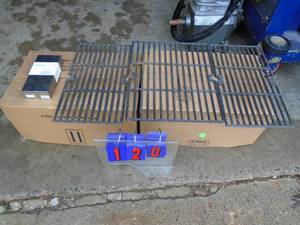 New 17 x 32 grill grates with smoker box. As shown.