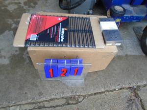 New adjustable grill grates. 19 wide with smoker box. As shown.