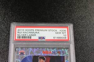 lot 152 image: 2019-20 Hoops Premium Stock Silver Laser Prizm Rui Hachimura #206 Rookie Card PSA 10